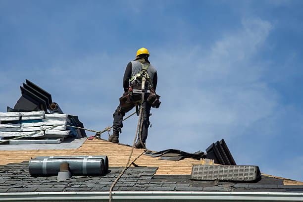 Professional Roofing technician working in East Brookfield, MA